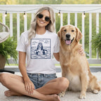 Woman with dog wearing t-shirt with illustration of dog in pool.