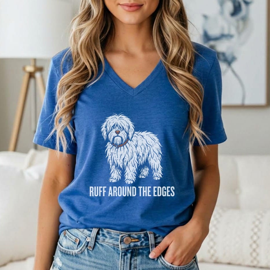 Blue v-neck t-shirt with a shaggy white dog graphic and text "RUFF AROUND THE EDGES."