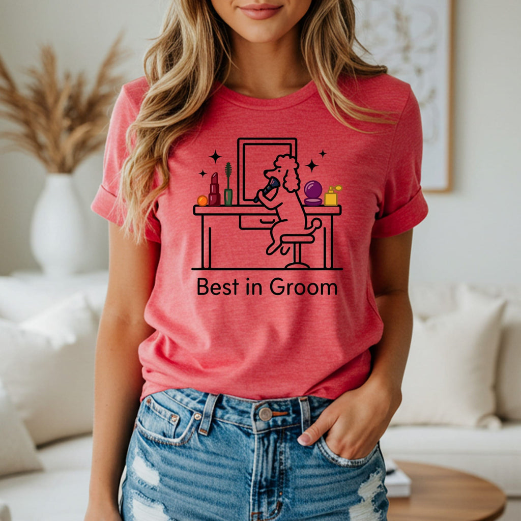 Woman wearing a t-shirt with a poodle at a vanity, text reads "Best in Groom".