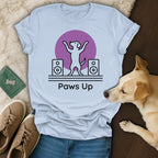 Light blue t-shirt with "Paws Up" text and dog dancing graphic.