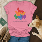 Pink t-shirt with "sorry i'm late, dog traffic" and colorful dog graphic.