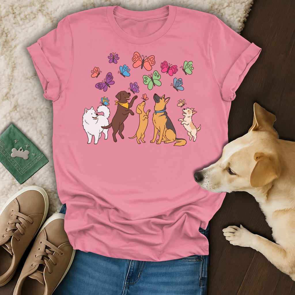 Pink t-shirt with cartoon dogs and colorful butterflies illustration.