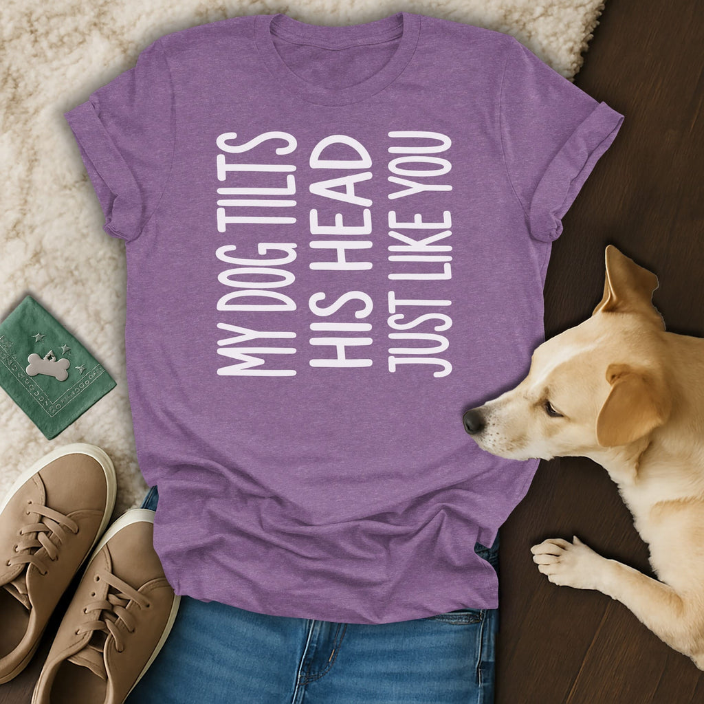 Purple t-shirt with white text "MY DOG TILTS HIS HEAD JUST LIKE YOU"