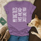 Purple t-shirt with white text "MY DOG TILTS HIS HEAD JUST LIKE YOU"