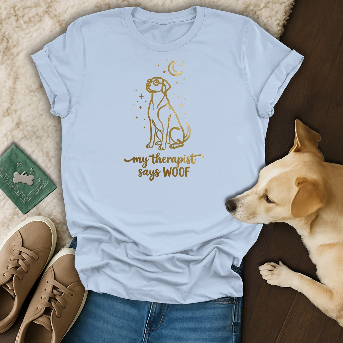 Light blue t-shirt with gold dog graphic and text "my therapist says WOOF".