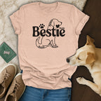 Peach t-shirt with "Bestie" and dog silhouette graphic.