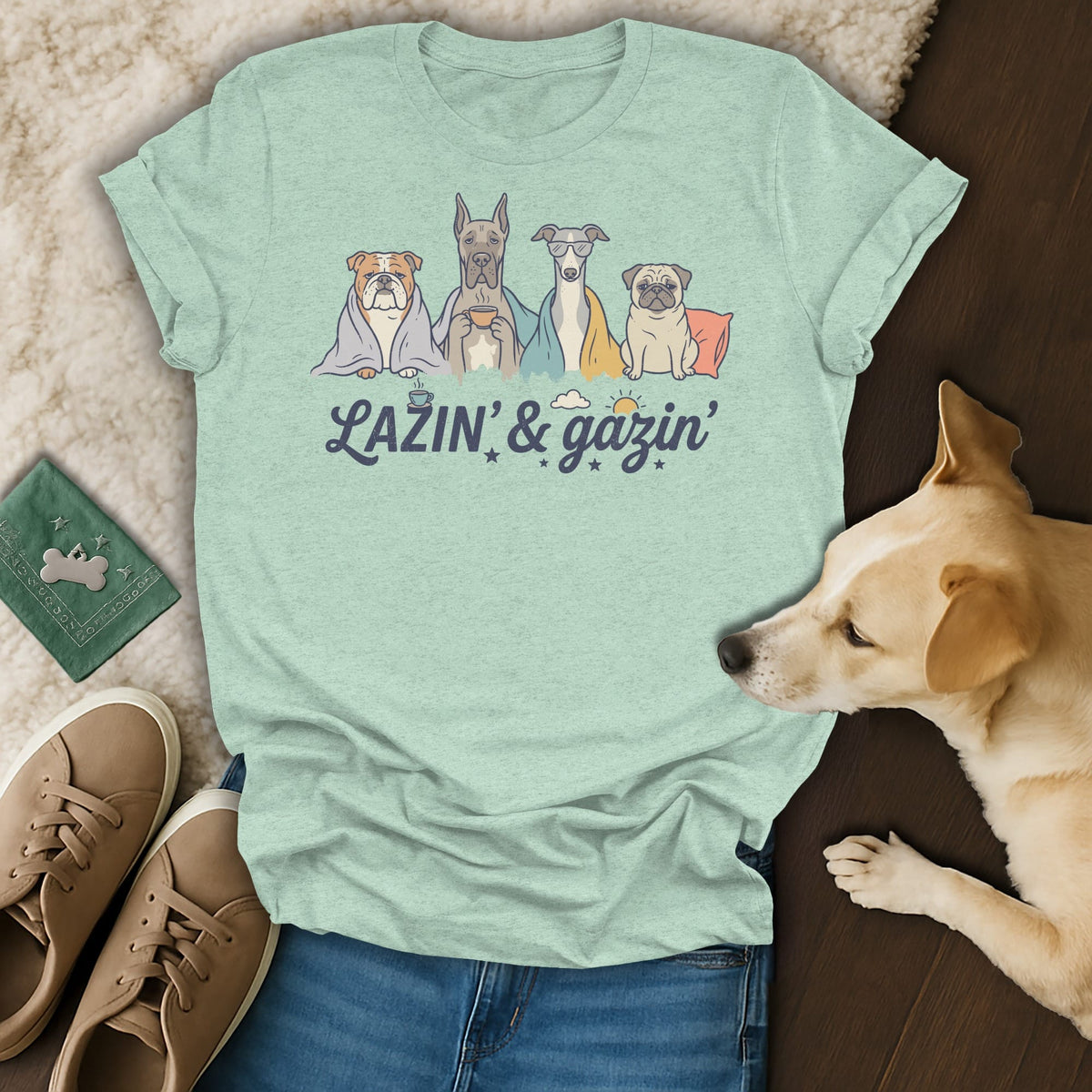 Light green t-shirt with cartoon dogs and the text "Lazin' & gazin'".