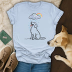 Line drawing of a happy dog sitting under a rainbow cloud with raindrops.