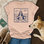 Basset hound wearing goggles floats on a tube in water with sun.