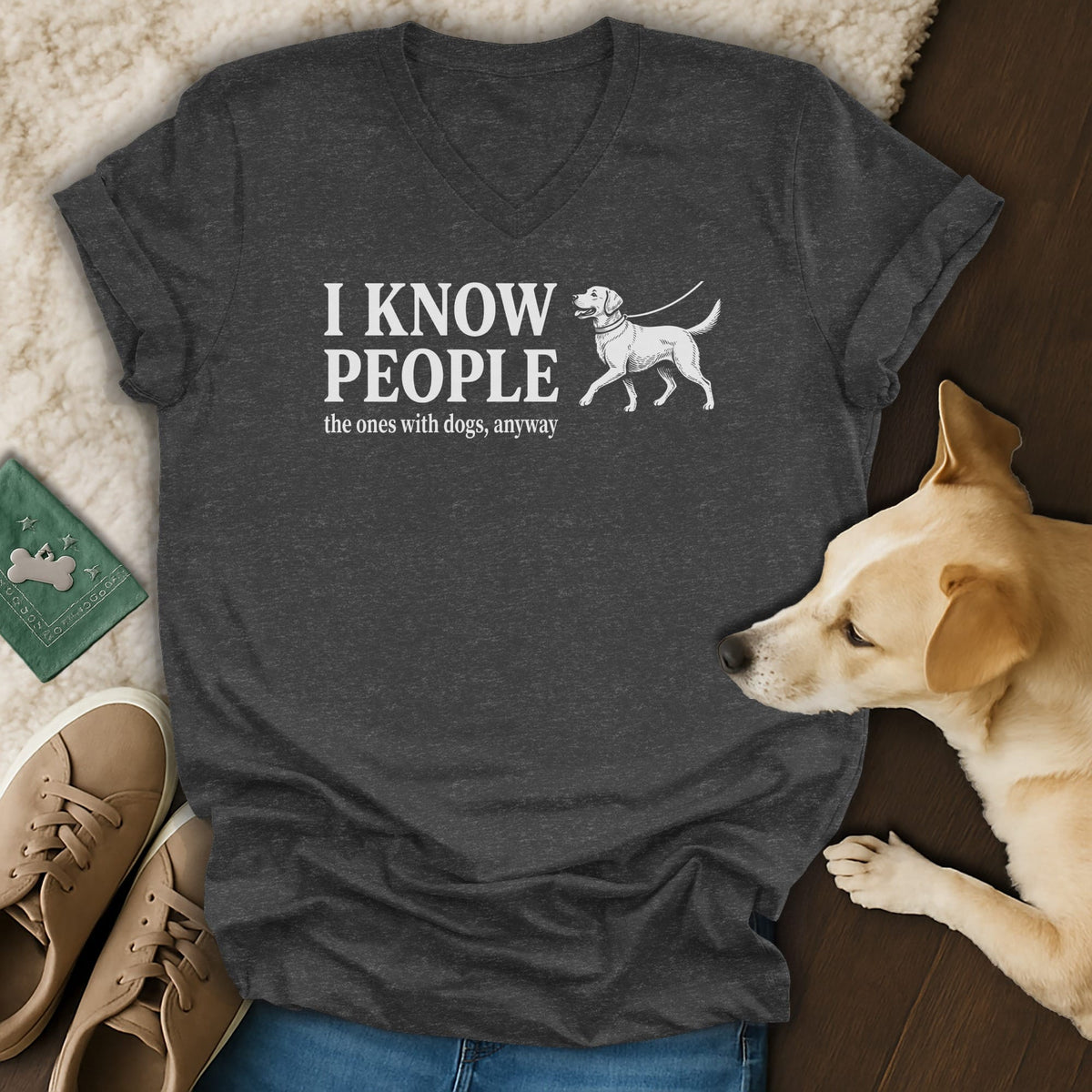 Dark gray v-neck t-shirt with "I KNOW PEOPLE the ones with dogs, anyway" text and dog graphic.