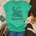 Green t-shirt with dog illustration and text "Rainy Day Fund."