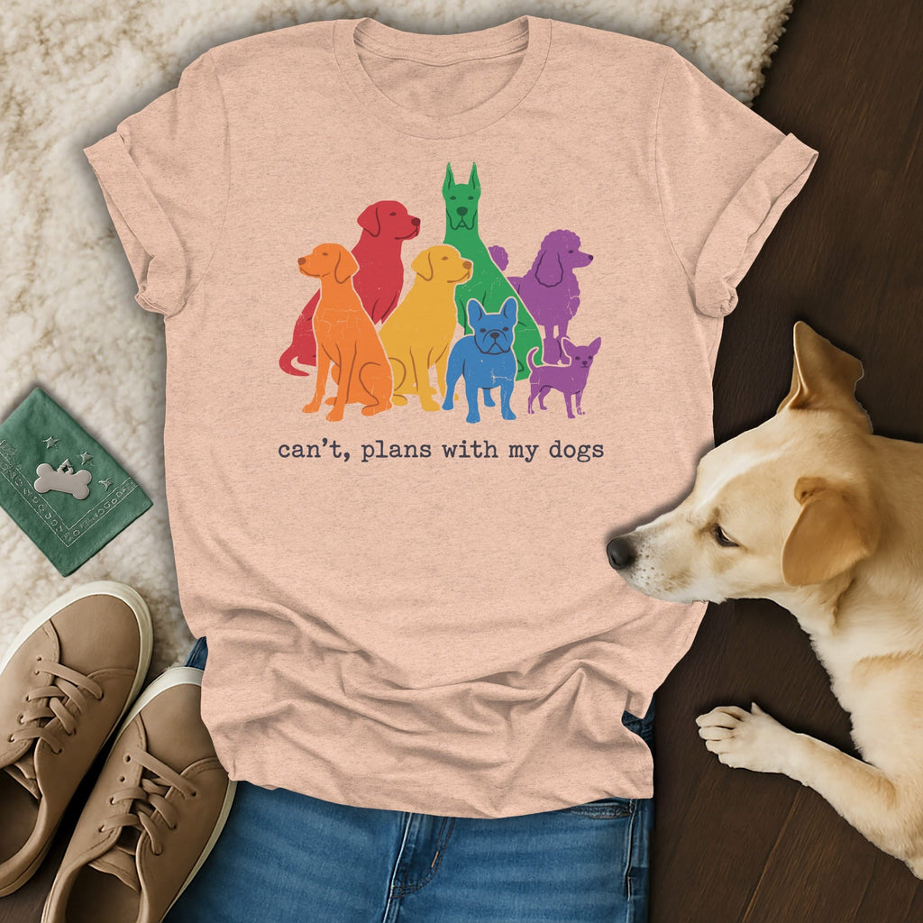 Peach t-shirt with colorful dogs and text "can't, plans with my dogs".
