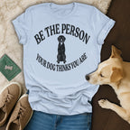 Light blue t-shirt with black distressed text and dog graphic.