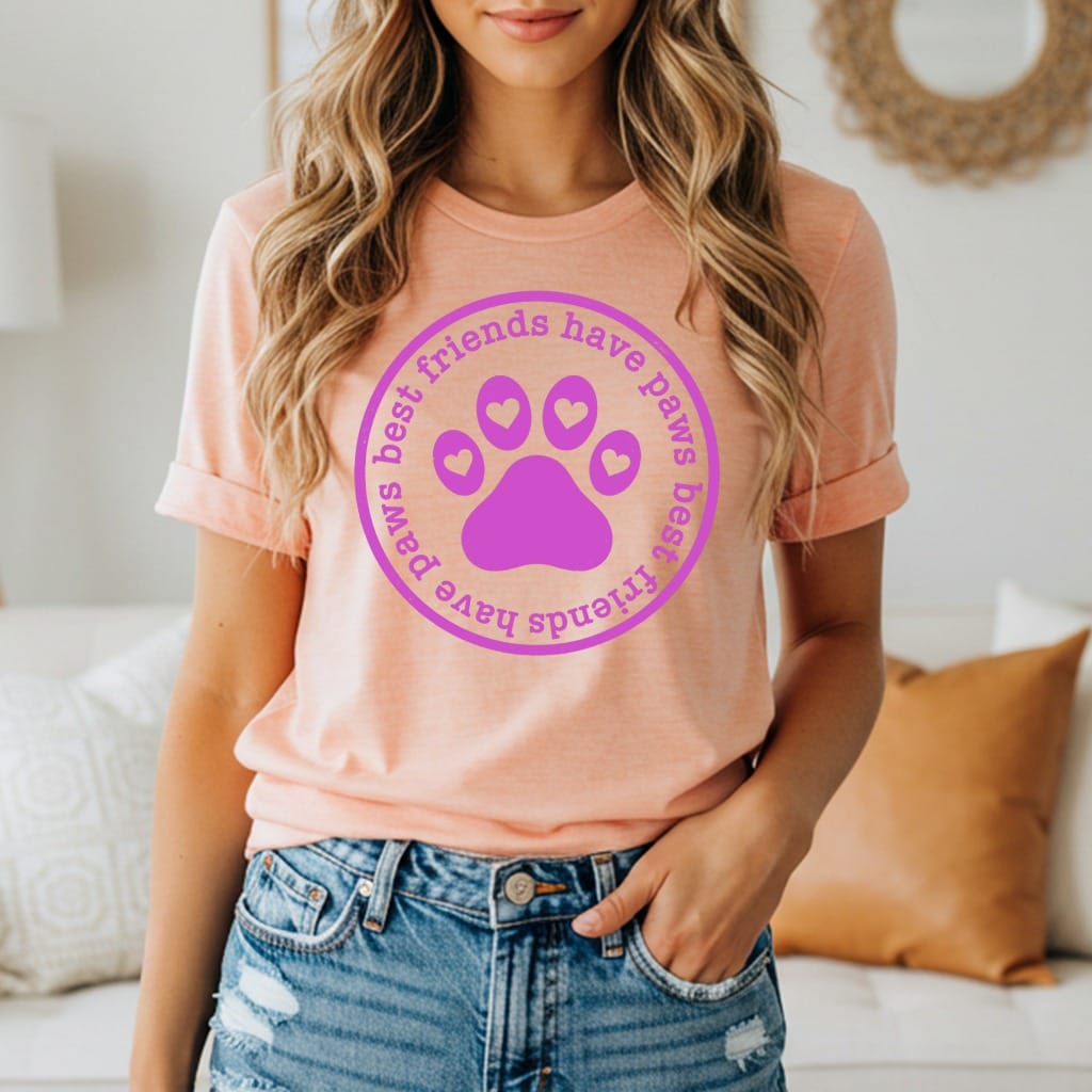 Peach t-shirt with purple paw print and "best friends have paws" text.