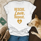 White t-shirt with "RESCUE. LOVE. REPEAT." and a paw print heart.