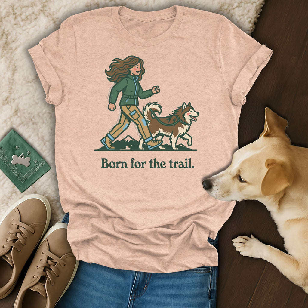 T-shirt with graphic of person and dog walking, text "Born for the trail."