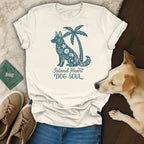 Cream t-shirt with a teal dog and palm tree design, reading "Island Heart DOG SOUL".
