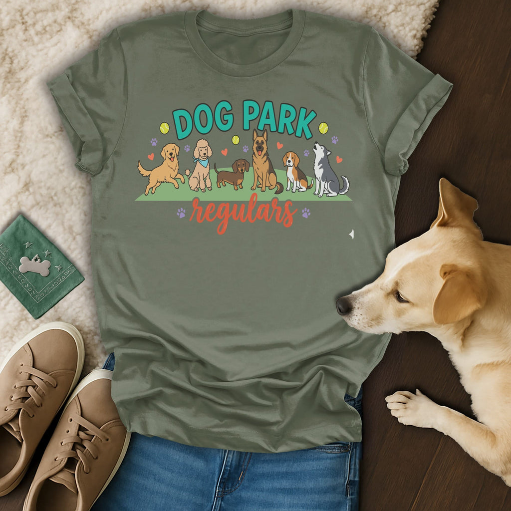 Dog Park Regulars t-shirt with cartoon dogs and paw print accents.
