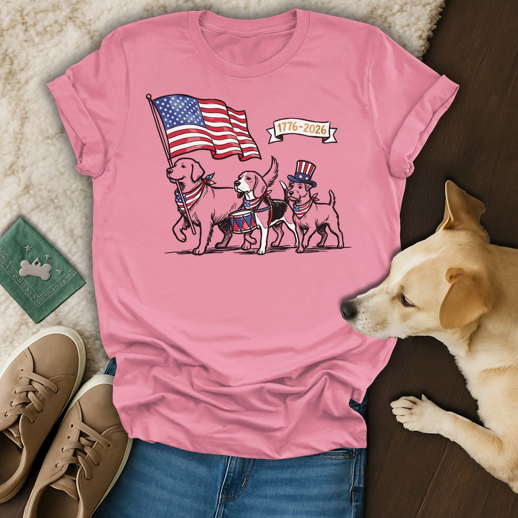 Three dogs in patriotic attire march with a flag, drum, and banner "1776-2026".