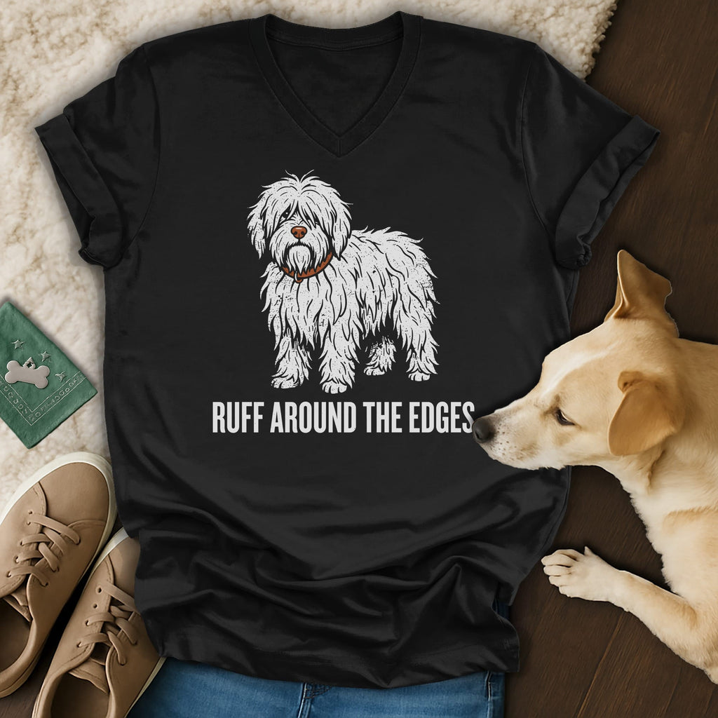 Black t-shirt with distressed white graphic of a shaggy dog and text "RUFF AROUND THE EDGES".