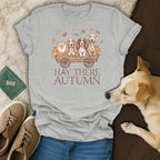 Grey t-shirt with cartoon dogs in a wagon and text "Hay There Autumn".