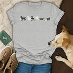 Grey t-shirt with cartoon dogs dressed as ghosts for Halloween.