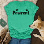 Green t-shirt with "Pawrent" text and paw print, next to dog and shoes.