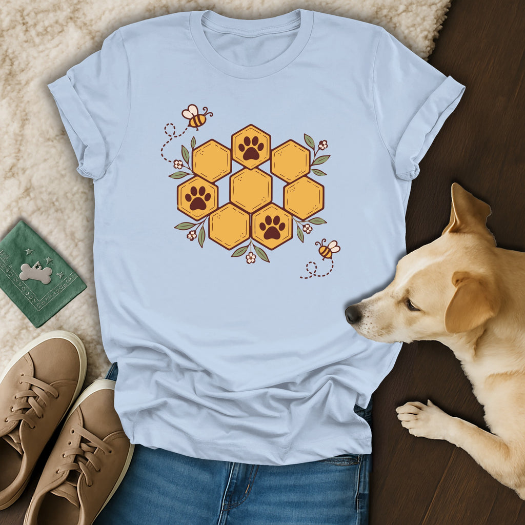 Light blue crewneck t-shirt featuring a honeycomb graphic with paw prints, surrounded by bees and flowers.