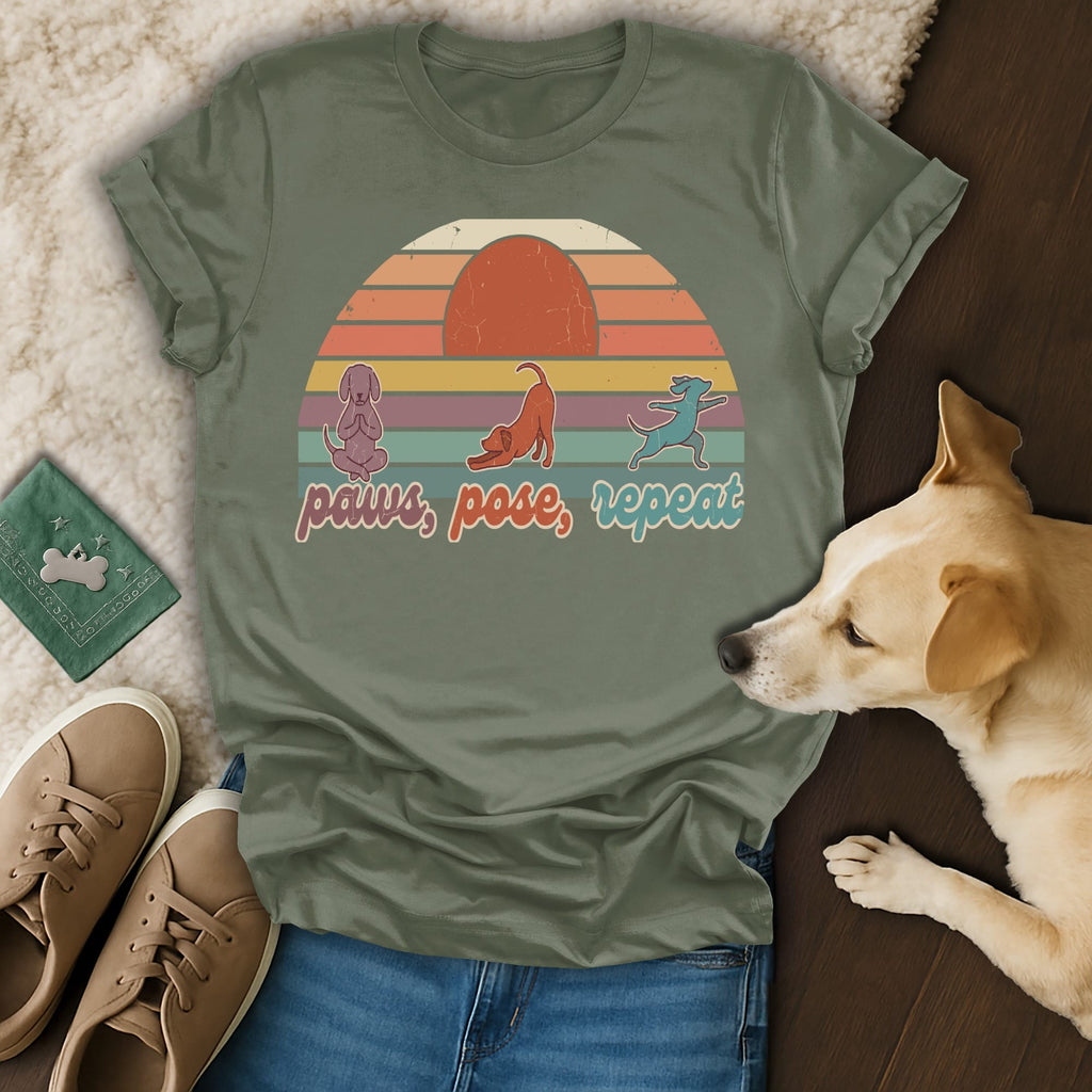 Olive t-shirt with sunset graphic and "paws, pose, repeat" text.