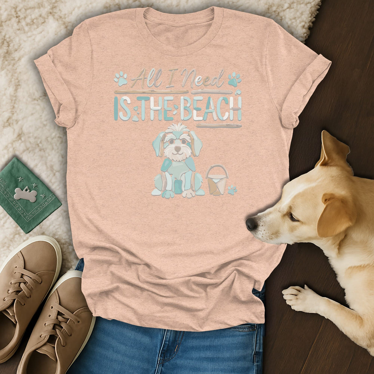 Peach t-shirt with "All I Need Is The Beach" text and a cartoon dog.