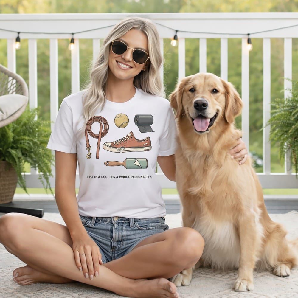 Woman wearing t-shirt with dog-themed graphic text "I have a dog. It's a whole personality."
