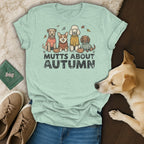 Light teal t-shirt with four dogs and text "MUTTS ABOUT AUTUMN".