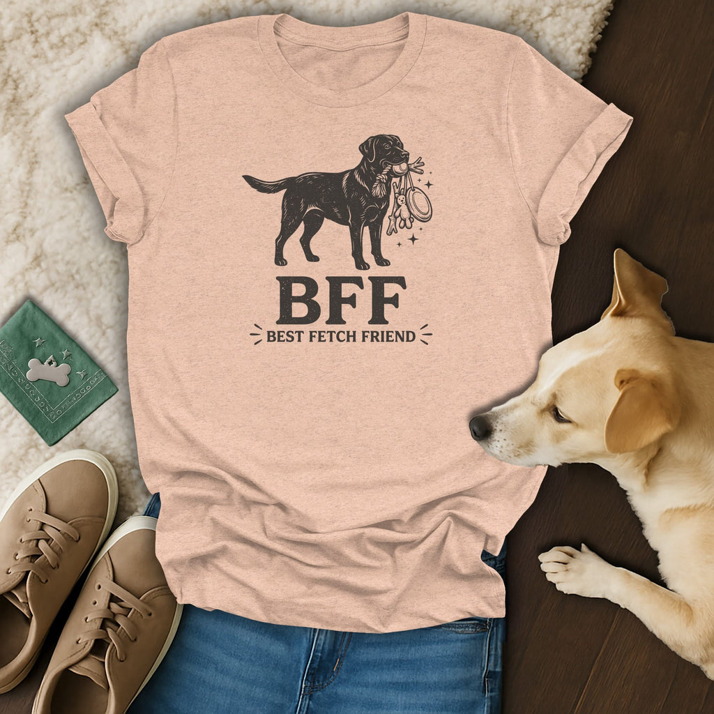 Peach t-shirt with black dog graphic holding fetch toys and text "BFF Best Fetch Friend".