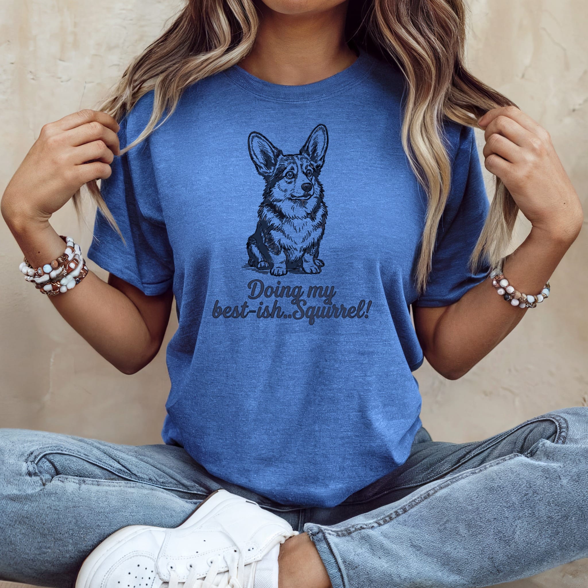 Blue t-shirt with a cartoon corgi and text "Doing my best-ish... Squirrel!".