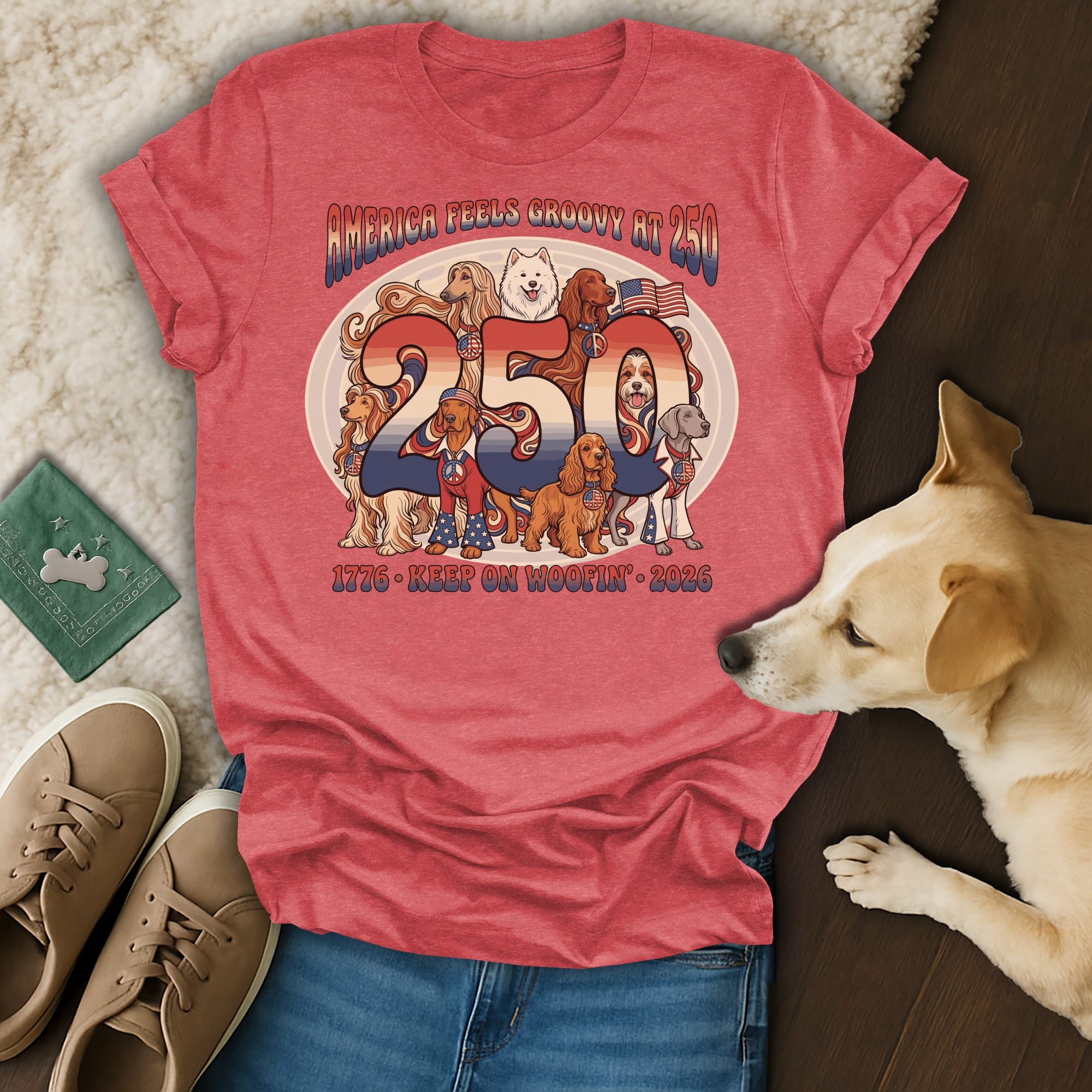 T-shirt with "America Feels Groovy 250 1776-2026 Keep On Woofin'" and dogs.