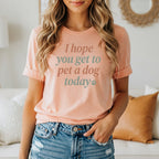 Peach t-shirt with "I hope you get to pet a dog today" text and paw print.