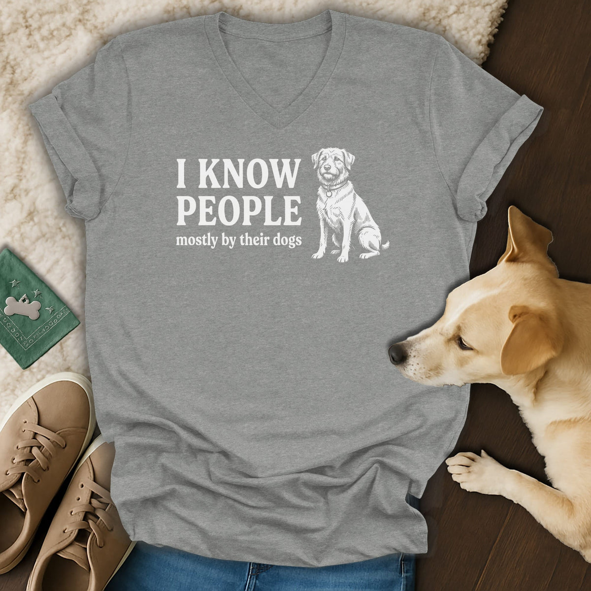 Grey v-neck t-shirt with "I KNOW PEOPLE mostly by their dogs" and a dog illustration.