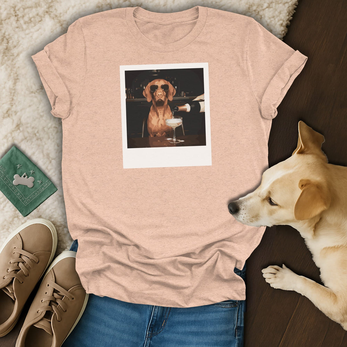 T-shirt with a dog wearing sunglasses at a bar, being served champagne.
