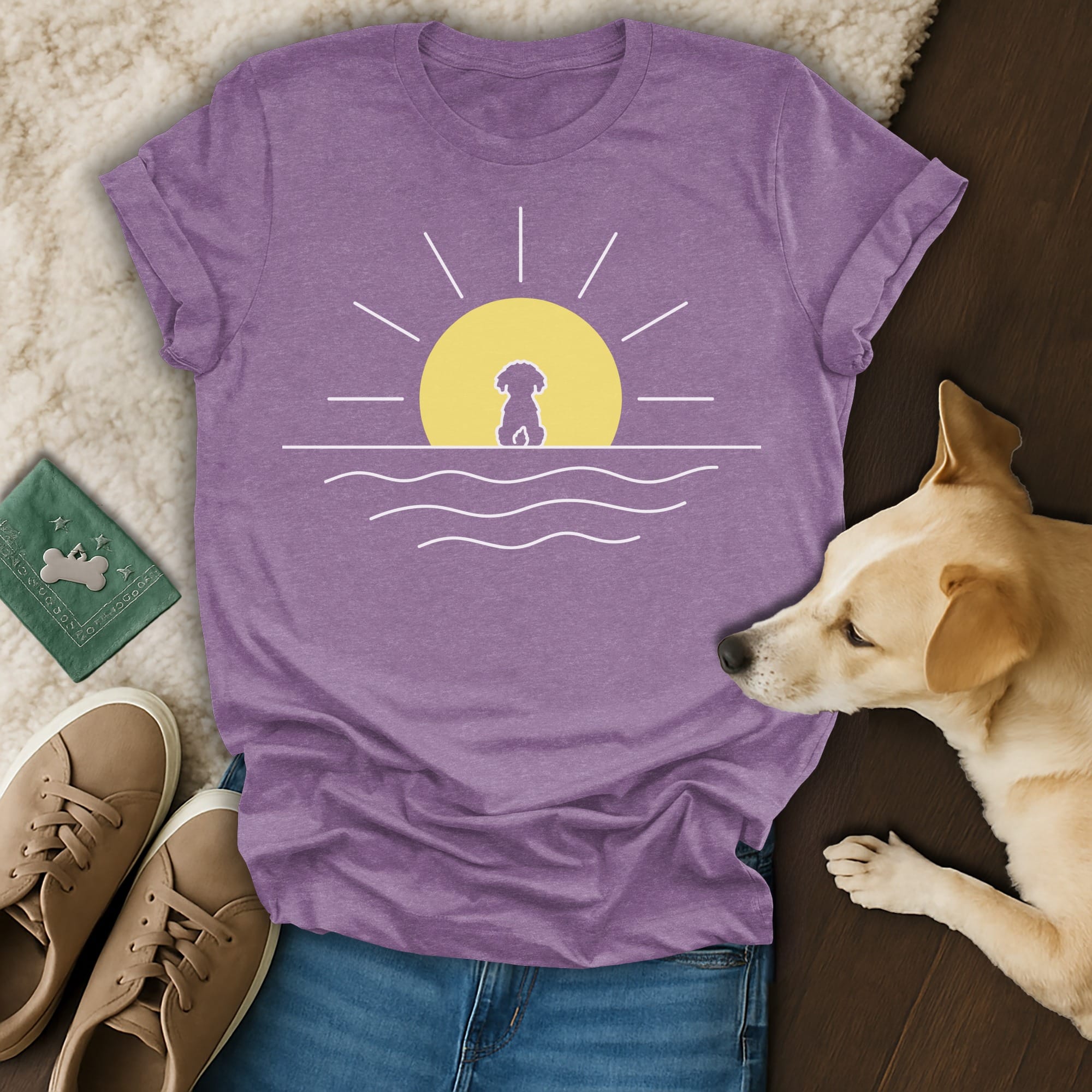 Purple t-shirt with a minimalist sunrise and dog silhouette design.