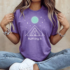 Purple t-shirt with a tent, dog, and celestial graphic with "Ruff-ing It" text.