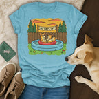 Corgis in a kiddie pool with "No Days Off" text.
