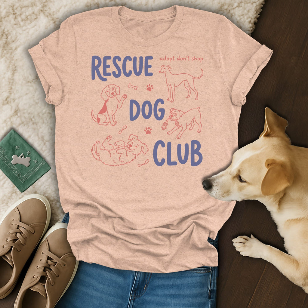 Peach t-shirt with "RESCUE DOG CLUB" text and line drawings of dogs.