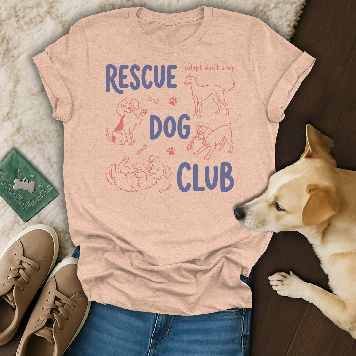 Peach t-shirt with "RESCUE DOG CLUB" text and line drawings of dogs.