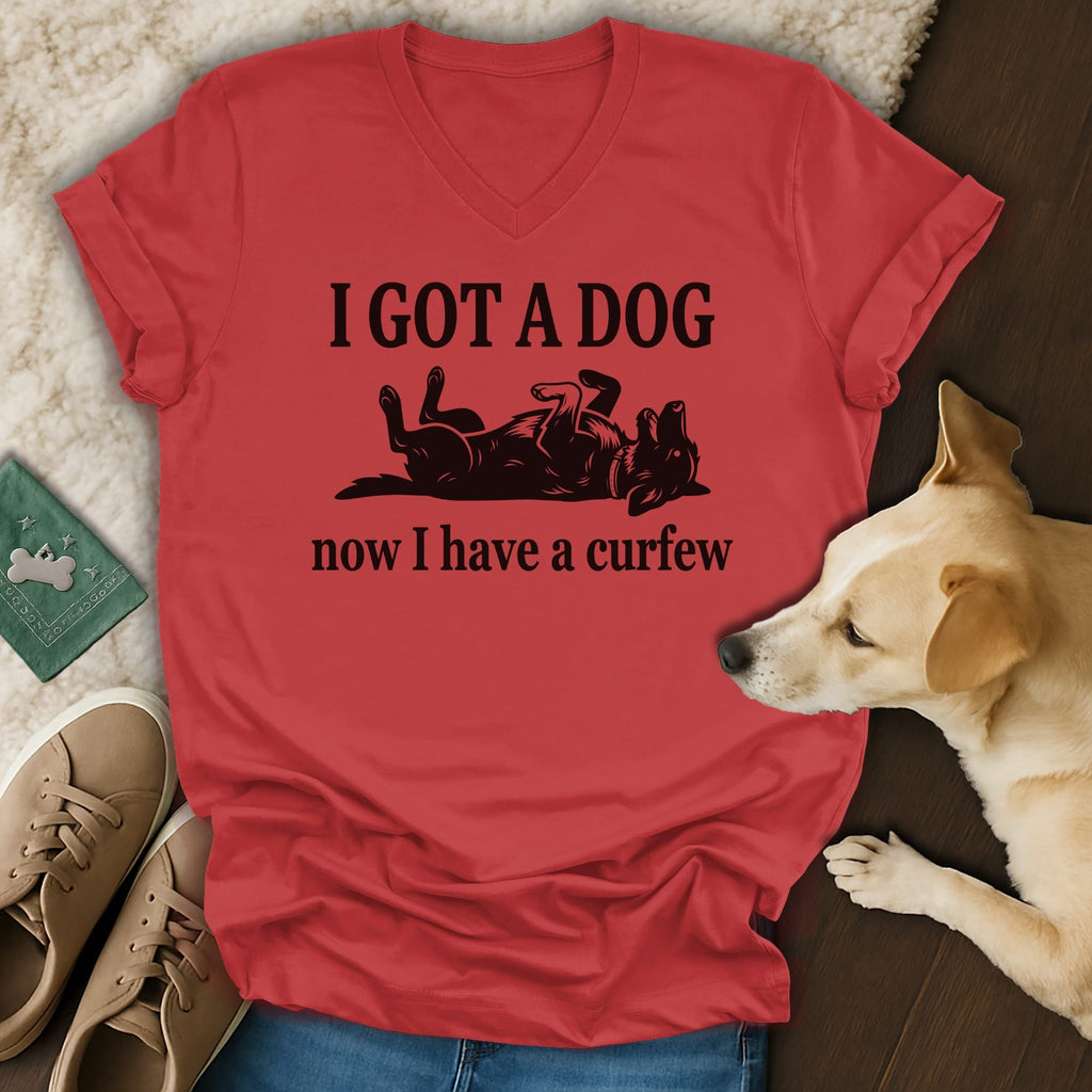 Red t-shirt with black text "I GOT A DOG now I have a curfew" and dog graphic.