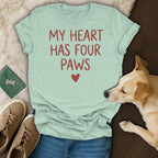 Light blue t-shirt with red text "MY HEART HAS FOUR PAWS" and a heart.