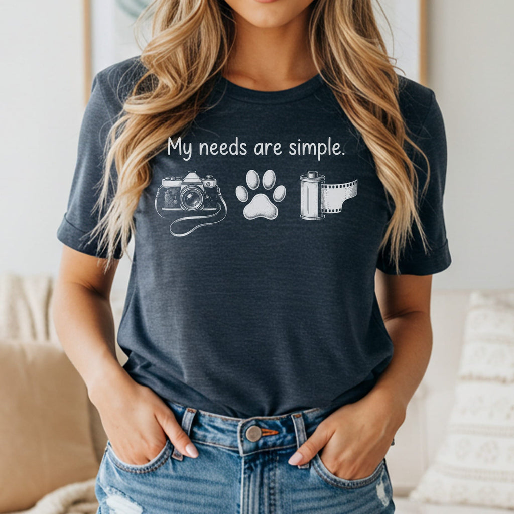 Dark grey t-shirt with white graphic of camera, paw print, and film roll, and text.