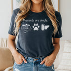 Dark grey t-shirt with white graphic of camera, paw print, and film roll, and text.