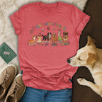T-shirt with dogs and text "Spring Paws in the Air" in a colorful drawing.