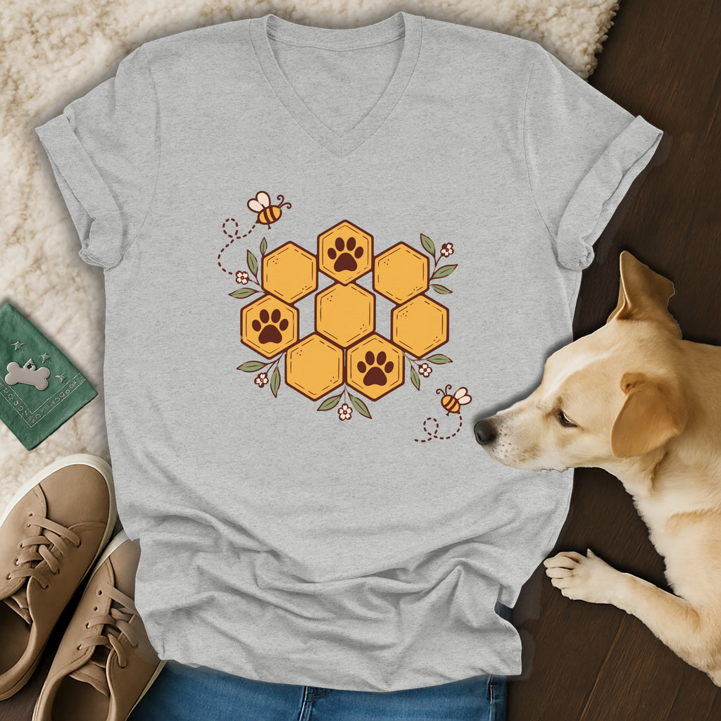 Gray V-neck t-shirt featuring a honeycomb graphic with paw prints, surrounded by bees and leaves.