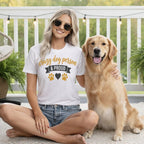 Woman wearing a "crazy dog person & proud" t-shirt with a golden retriever.